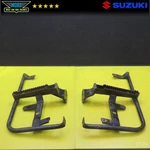 Genuine Oem 2003 Suzuki Eiger 400 Stands Rests 43510-38F30 Used. Price: $20.52.