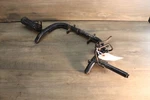2003 Kawasaki KFX80 Front Foot Rest Peg Bracket Mount 34003-S003-503 Used. Price: $35.00.