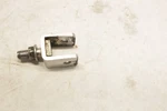 Rear Step Holder (see Photos) 34003-1292 1999 Kaw Vulcan 1500 Used. Price: $15.00.