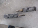 85-86 Honda TRX125 Step Bar Foot Pegs Pair 50610-VM6-000 , 50661-958-020 Used. Price: $19.00.